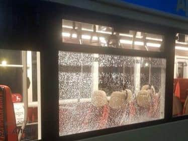 The windows of two buses outside Castle Hill Hospital in Hull were smashed by vandals, the bus company has said.