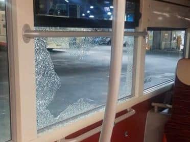 The windows of two buses outside Castle Hill Hospital in Hull were smashed by vandals, the bus company has said.