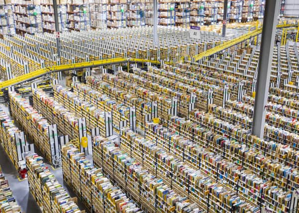 Inside an Amazon distribution depot - will Covid-19 lead to greater automation in inudstry and an increasing reliance on e-commerce?