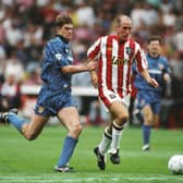 Flashback: Sheffield United forward Alan Cork outpacing Gary Pallister of Manchester United at Bramall Lane on August 15, 1992. Picture: Getty Images