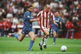 Flashback: Sheffield United forward Alan Cork outpacing Gary Pallister of Manchester United at Bramall Lane on August 15, 1992. Picture: Getty Images