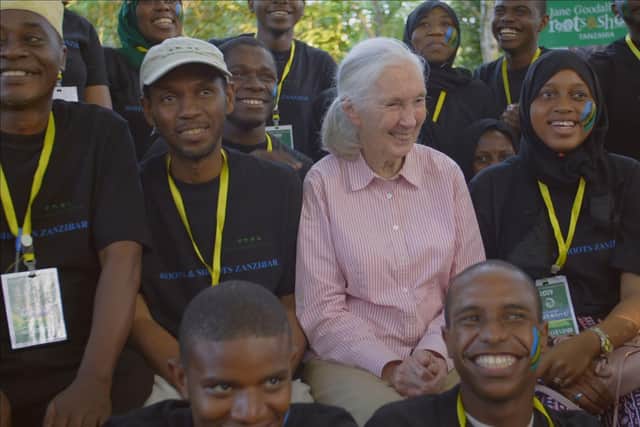 Dr. Jane Goodall posing with members of Roots & Shoots, a program of the Jane Goodall Institute. Picture: PA Photo/National Geographic/Bill Wallauer.