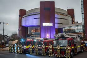 Members of the fire brigade clapping outside the Nightingale Hospital at the Harrogate Convention Centre in Harrogate, to salute local heroes during Thursday's nationwide Clap for Carers NHS initiative to applaud NHS workers fighting the coronavirus pandemic.