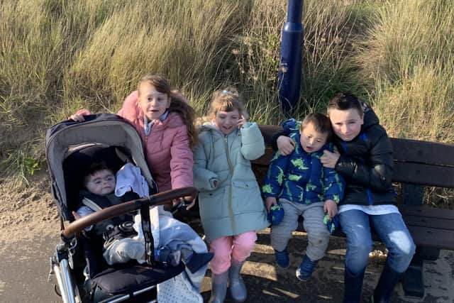 Ben has adopted six children including Noah, far left, who sadly died just before Christmas