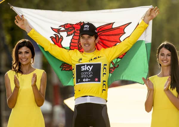 2018 winner: Team Sky's Geraint Thomas celebrates winning the Tour de France.
