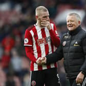 Relishing the challenge: Manager Chris Wilder with Oli McBurnie. Picture: Sportimage