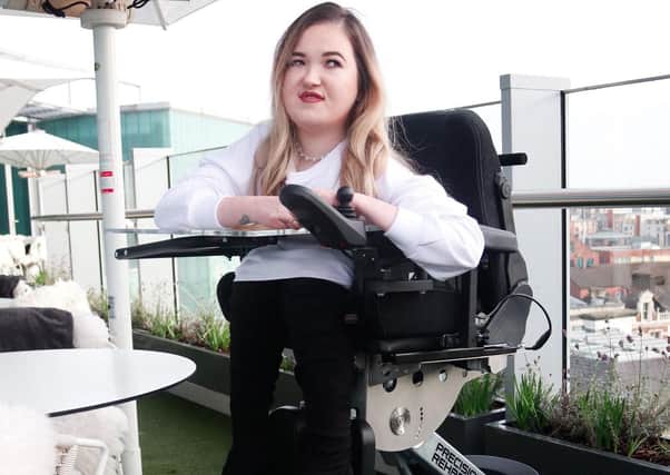 Kateryna Pemberton who has taken delivery of a £23,000 powered wheelchair which has changed her life PICTURE: Penny Haskell