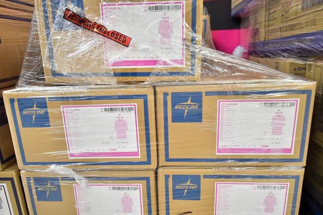 Generic photo of boxes of medical surgical gowns. Photo: PA