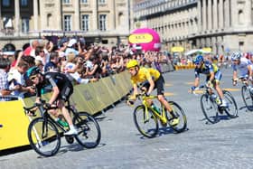 Great Britain's Bradley Wiggins of Sky Pro Racing (yellow jersey), follows team mate, Chris Froome (left), in the Tour de France.