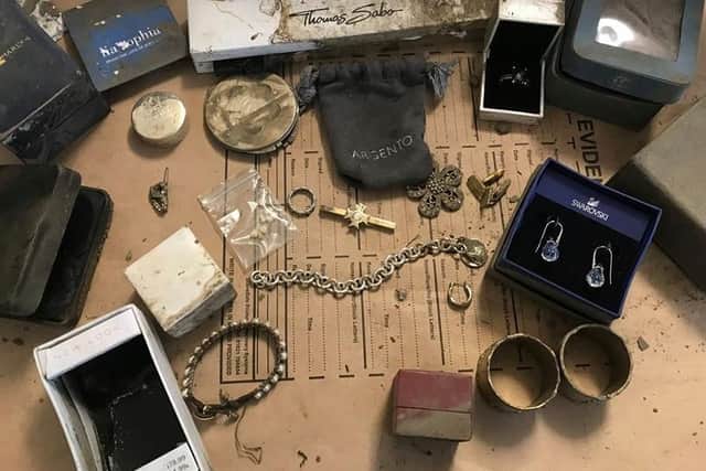 All the items recovered by North Yorkshire Police from a roadside in Eggborough. Among them include a watch inscribed with, "To Thomas, Love Dad" which has yet to be claimed.