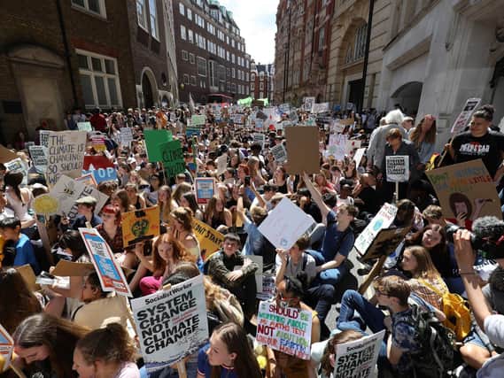 UK students pictured taking part in a strike for the climate crisis as part of the YouthStrike4Climate movement. Photo credit: Aaron Chown