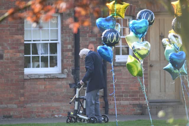 Captain Tom Moore, a 99-year-old veteran, who has completed the 100th length of his garden at his home in Marston Moretaine, Bedfordshire, raising over £12m for the NHS with donations to his fundraising challenge from around the world.