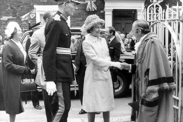 Lord Halifax introduces the Queen to Mayor of Beverley Councillor Eric Bielby in 1977.