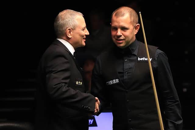 Well done: Barry Hawkins is congratulated by referee Brendan Moore after making a maximum 147 at the York Barbican.