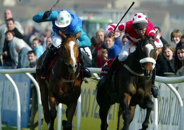 Ryalux and Richie McGrath (right) get the better of Stormez and AP McCoy in the 2003 Scottish Grand National at Ayr.