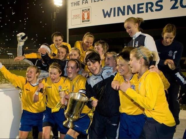 Sue Smith winning the 2010 League Cup with Leeds United team-mates including Steph Houghton, Rachel Daly, Carly Telford, Gemma Bonner, Jade Moore and Sophie Bradley.