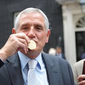 Norman Hunter kisses his medal, presented by Prime Minister Gordon Brown for representing his country in the 1966 World Cup. (Picture:: Ian Nicholson/PA Wire)