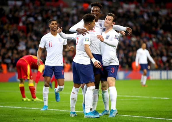 England's 1000th game: Tammy Abraham celebrates scoring his side's seventh goal v Montenegro.