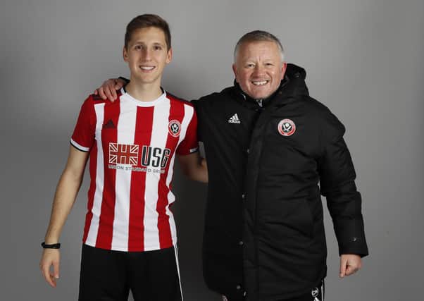 May be staying: Panagiotis Retsos welcomed by manager Chris Wilder.