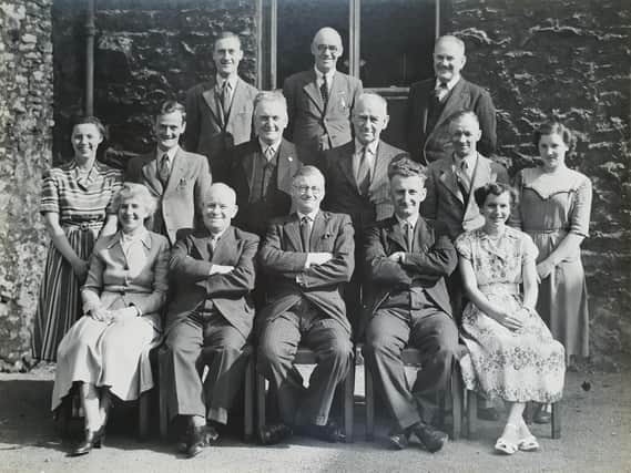 Alfred Wainwright is pictured in the middle with Percy Duff seated on his left.