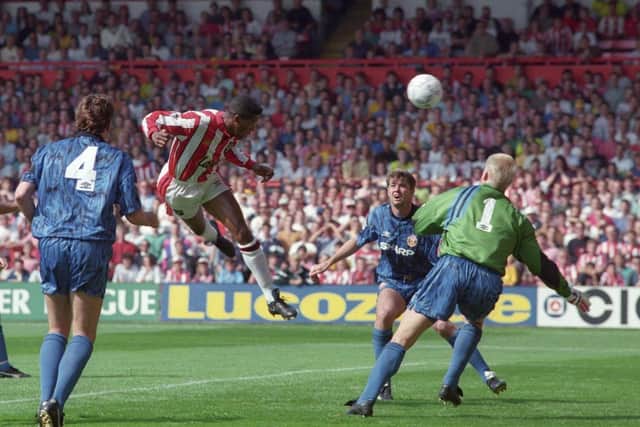 Brian Deane makes football history as he scores the first ever Premier League goal in a 2-1 victory for the Blades against Manchester United at Bramall Lane in August 1992