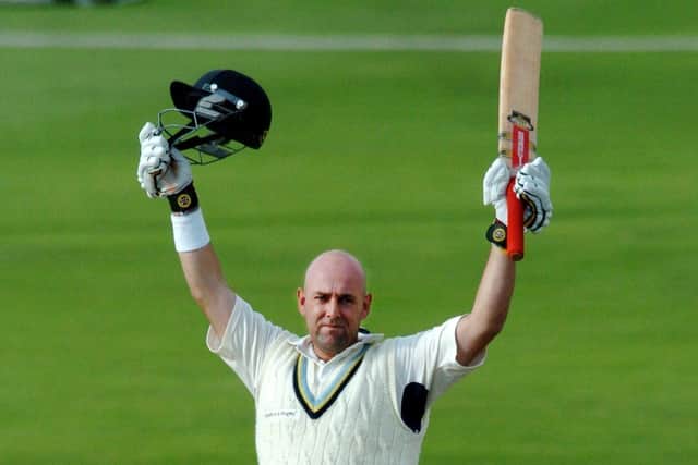 FAN FAVOURITE: Darren Lehmann celebrates a century during his time with Yorkshire CCC.