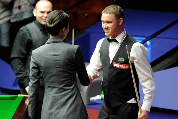 Top break: Stephen Hendry iis congratulated by match referee Zhu Ying after he scored a maximum 147 during the World Snooker Championships at the Crucible Theatre, Sheffield.