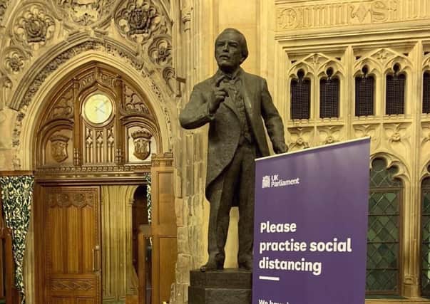 Strict social distancing measures are in force at the Houses of Parliament.