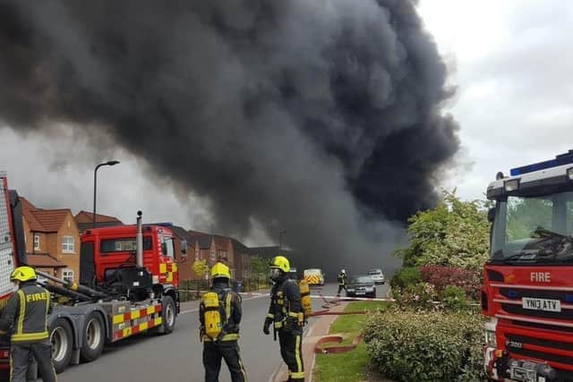 South Yorkshire Fire and Rescue teams deal with a fire in Rotherham.