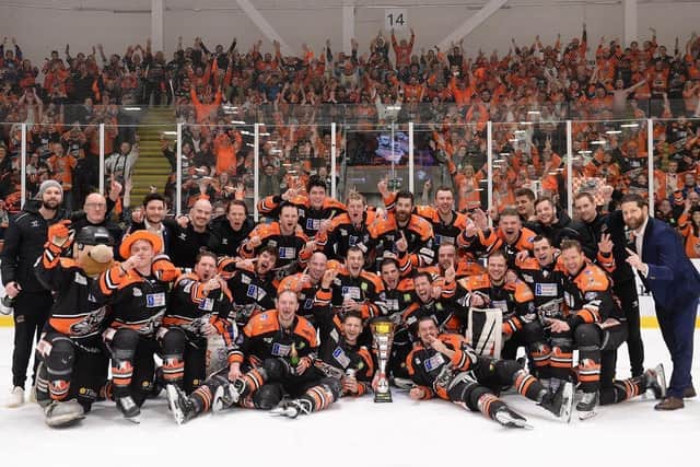 WINNING END: Robert Dowd (third from right, back row), celebrates Sheffield Steelers' Challenge Cup triumph over Cardiff Devils in march. Picture: Dean Woolley.