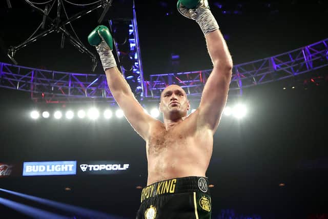 The Gypsy King: Tyson Fury celebrates after knocking down Deontay Wilder during their Heavyweight bout for Wilder's WBC and Fury's lineal heavyweight title on February 22, 2020 at MGM Grand Garden Arena in Las Vegas, Nevada. (Picture: Al Bello/Getty Images)