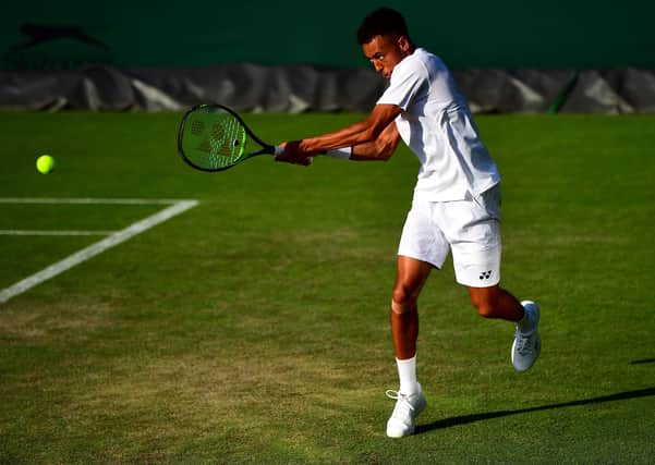 Paul Jubb in action on day two of the Wimbledon Championships at the All England Lawn Tennis and Croquet Club, Wimbledon. (Picture:: Victoria Jones/PA Wire)