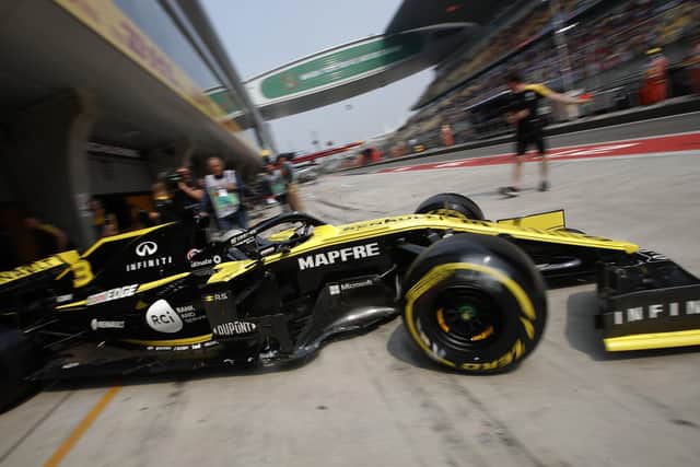 Formula 1 Drive to Survive - Renault driver Daniel Ricciardo of Australia steers his car out of the pit-lane during the second practice session for the Chinese Formula One Grand Prix at the Shanghai . (AP Photo/Andy Wong)