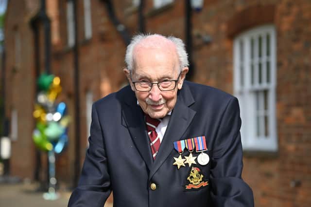 British World War II veteran Captain Tom Moore, 99, poses doing a lap of his garden in the village of Marston Moretaine, 50 miles north of London, on April 16, 2020. (Photo by JUSTIN TALLIS/AFP via Getty Images)