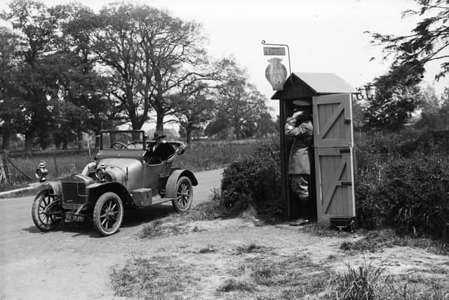 July 1919:  An Automobile Association scout on an emergency call-out.  (Photo by Topical Press Agency/Getty Images)