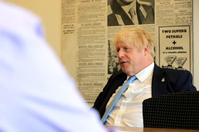 Boris Johnson during his visit to The Yorkshire Post last September - should the Government be doing more to support local newspapers?