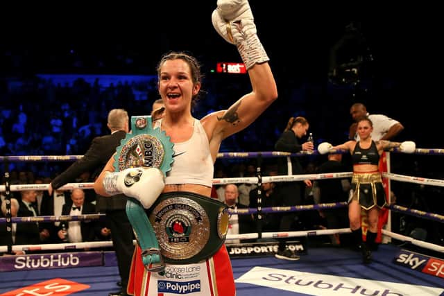 On top of the world: Terri Harper celebrates victory. Pictures: PA