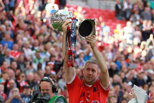Trophy time: York City's Jon Parkin lifts the FA Trophy after victory over Macclesfield Town at Wembley Stadium in 2017.