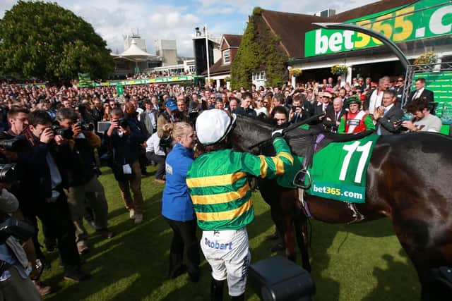 This was the scene at Sandown when Sir AP McCoy dismounted Box Office five years ago.
