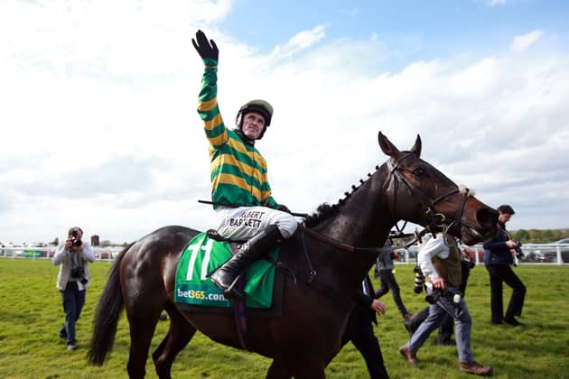 Sir AP McCoy acknowledges the crowds after his farewell wide on Box Office at Sandown five years ago.
