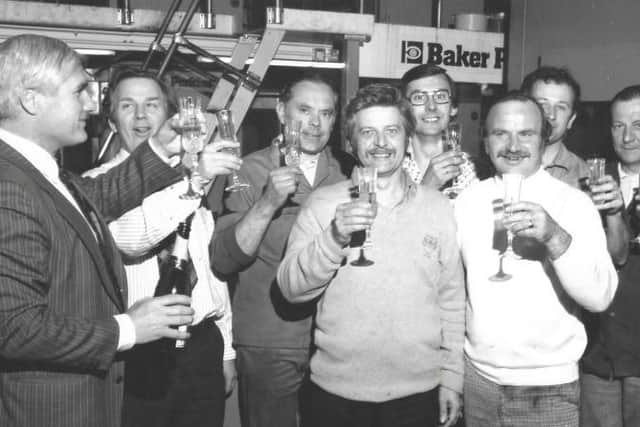 Malcolm Guest pictured (centre wearing black rousers) pictured at Leeds printing firm Petty and Sons.