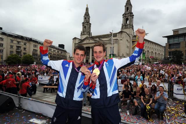 Jonny and Alistair Brownlee: Displaying their Olympic medals in Millennium Square, Leed. Picture: Simon Hulme