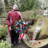 Tony Foulds tending to the memorial to the crew of the Mi Amigo that crashed in Endcliffe Park. Picture: Dean Atkins