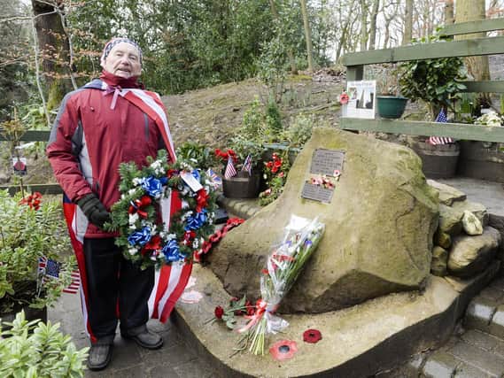 Tony Foulds tending to the memorial to the crew of the Mi Amigo that crashed in Endcliffe Park. Picture: Dean Atkins