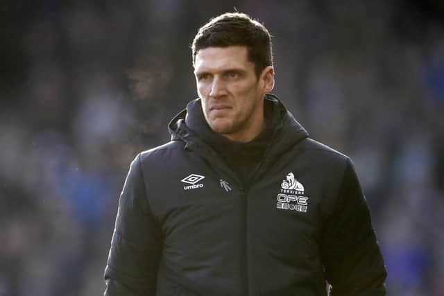 FINE EXAMPLE: Mark Hudson, himself a former defender, has been part of the team that have helped Michael Elphick keep his spirits up. Picture: Martin Rickett/PA