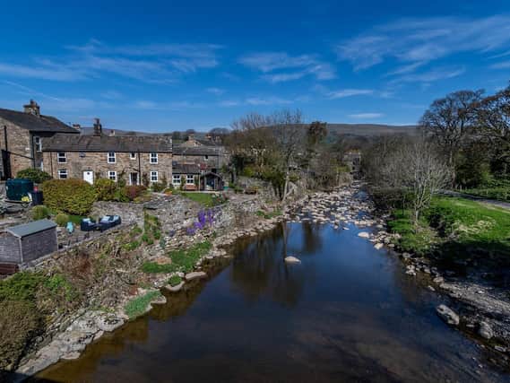 The River Bain which flows through the centre of the rural village of Bainbridge in the Richmondshire district of North Yorkshire. Picture: James Hardisty