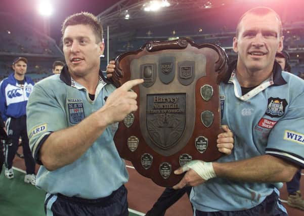 VICTORY SHIELD: Former Leeds Rhinos player and coach Dave Furner, left, and Adam Muir after winning the 2000 State of Origin with New South Wales.