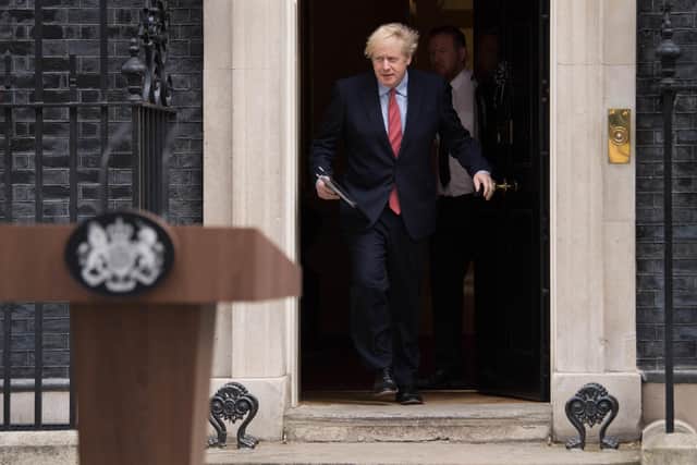 Prime Minister Boris Johnson makes a statement outside 10 Downing Street, London, as he resumes working after spending two weeks recovering from Covid-19. PA Photo. Picture: Stefan Rousseau/PA Wire