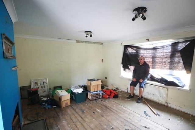 Kevin Lorryman in his bungalow which may have to be demolished
