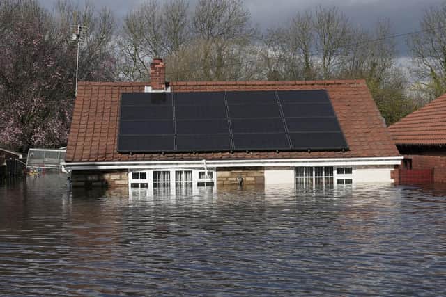 File photo dated 3/3/2020 of floodwater in Snaith, near Goole in East Yorkshire, surrounding the bungalow owned by Kevin and Catherine Lorryman